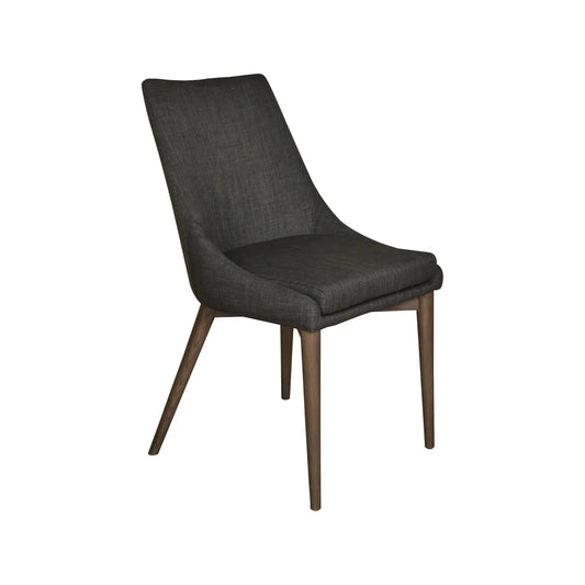 The Franny Dining Chair, Dark Gray is a sleek, modern piece with a dark gray upholstered seat and backrest. It features a minimalist design with angled wooden legs in a medium brown finish, complemented by a versatile design and removable cover. This chair exudes simple elegance perfect for contemporary interiors.