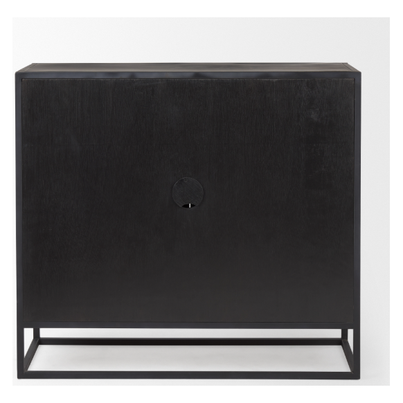 The Obsidian Media Cabinet showcases minimalist design with its sleek black metal frame and dark mango wood doors, accentuated by a central circular handle. Its modern aesthetic, characterized by clean lines and a matte finish, includes an innovative cable management port that stands out beautifully against a white background.