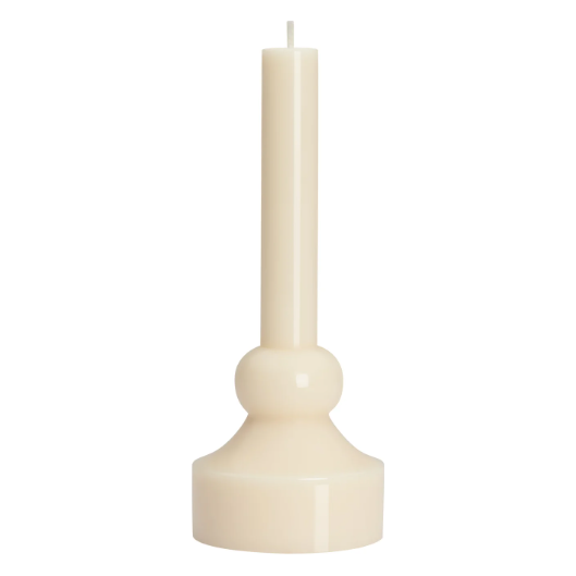 Introducing the Chess Piece Candle: a modern and minimalistic design featuring a cream-colored, glossy candle holder with a wide pillar base and cylindrical stem. Topped with a uniquely shaped, tall matching candle, it highlights smooth lines and uniform color. The candle remains unlit.