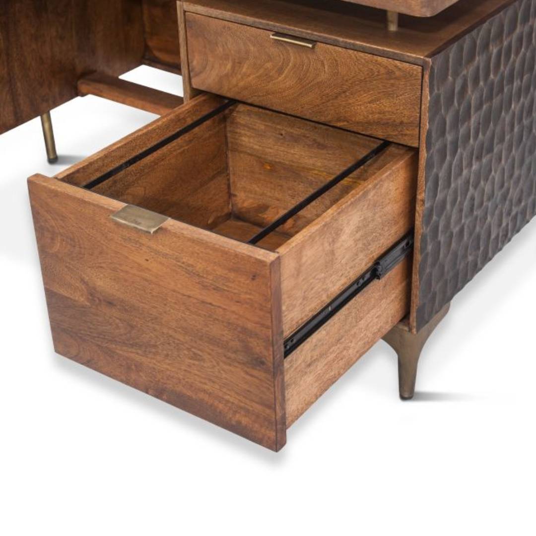 The Cruz Office Desk features a solid mango wood build, a large open drawer, natural wood finish paired with textured dark side panels, and short angled metal legs—ideal for modern offices.