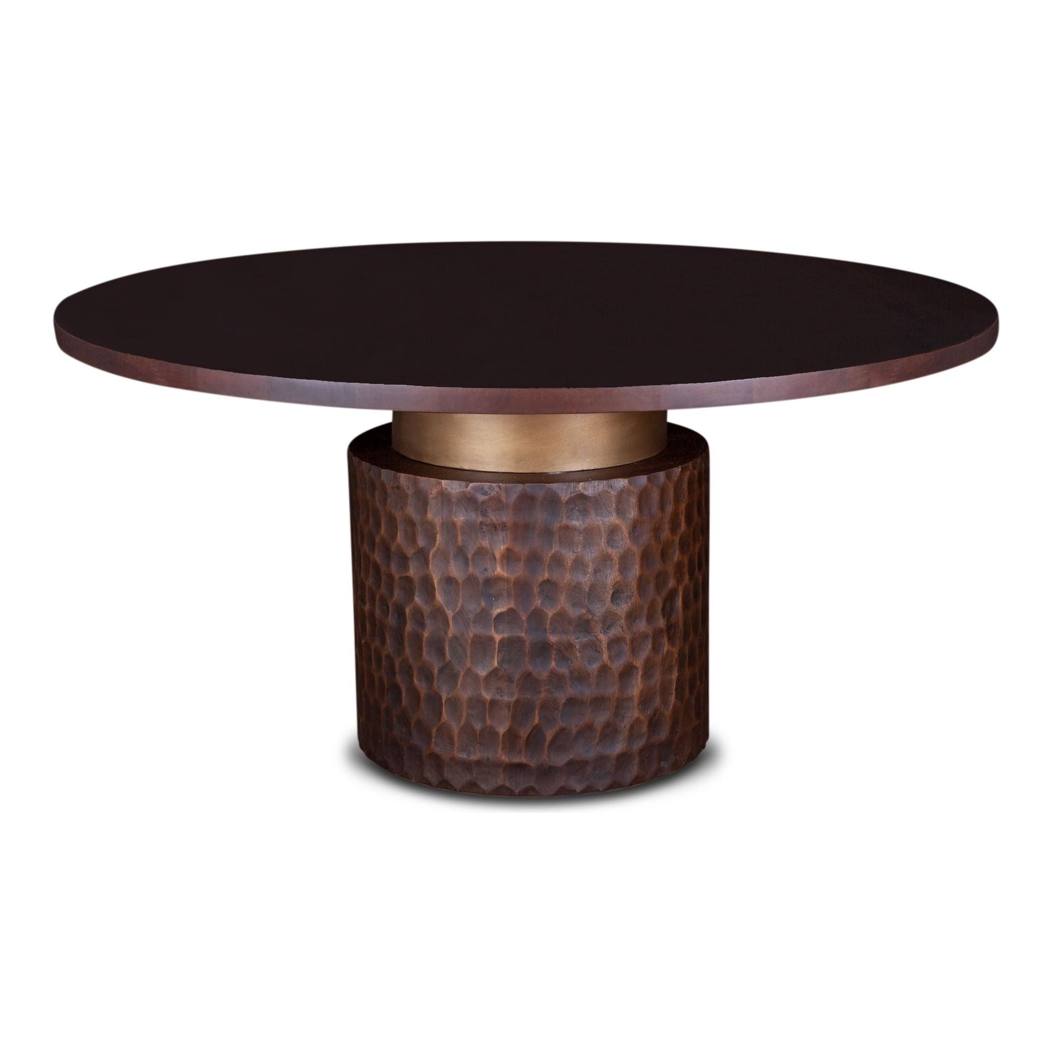The Cruz 60" Round Dining Table showcases a smooth dark brown top made from hand-carved mango wood. Its contemporary design features a textured copper base with a hammered finish, separated elegantly from the tabletop by a brass band.