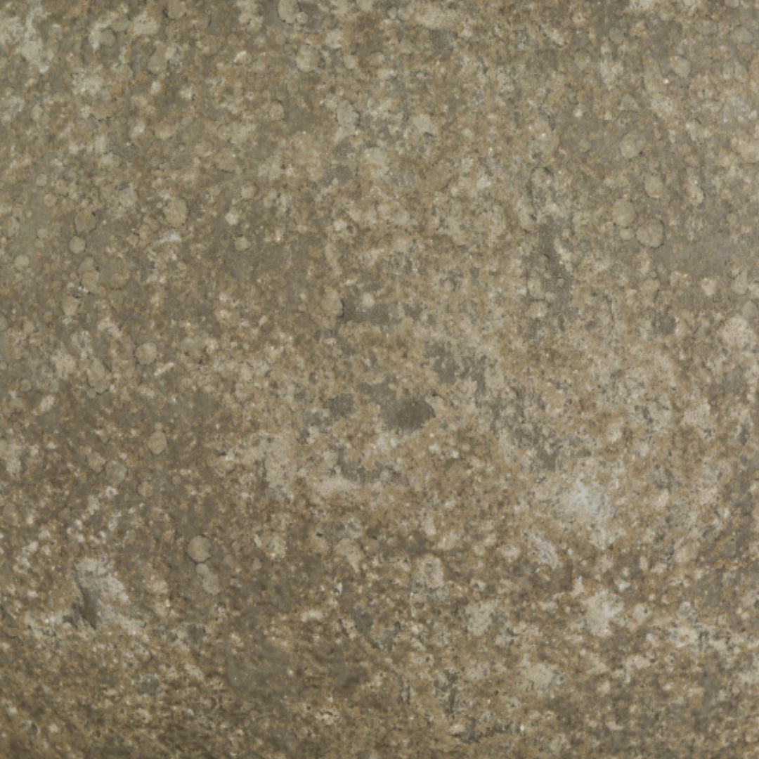A close-up of the Junalie Sage Marbled Glass Vase reveals a grainy, speckled texture in brown, tan, and gray tones with marbled patches and circular spots, resembling natural jute.