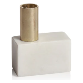 The Morphinan Marble Candle Holders (Set of 3) showcase an elegant, minimalist design with rectangular white marble bases and slightly off-center cylindrical brass holders. These pieces are perfect for home decor, providing a modern contrast between cool stone and warm metallic accents.