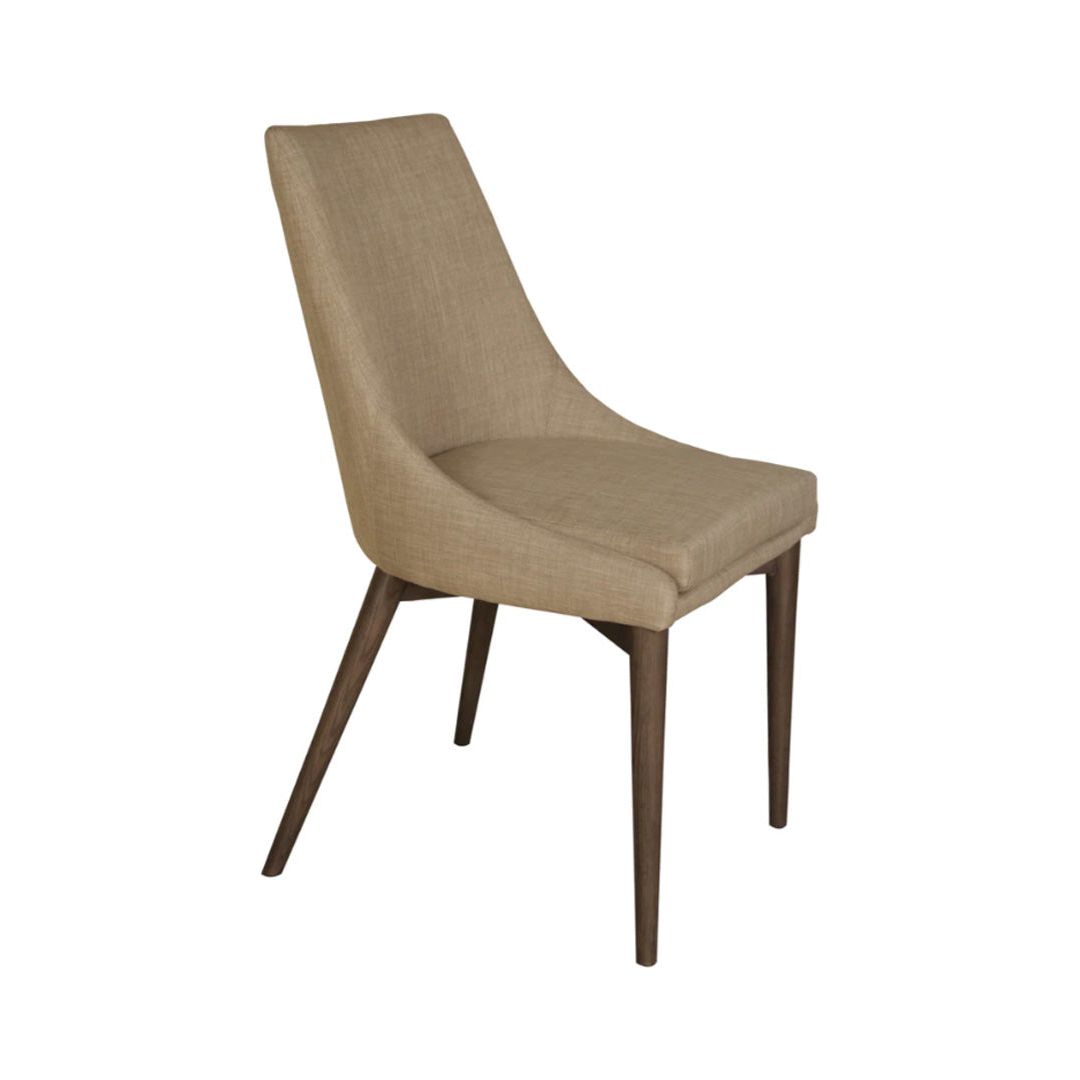 The Franny Dining Chair, Beige boasts a versatile design with its modern, beige upholstered seat and sleek, angled backrest. Shown against a white background, this chair features a padded seat and sits on four tapered wooden legs angled outward for both stability and style.