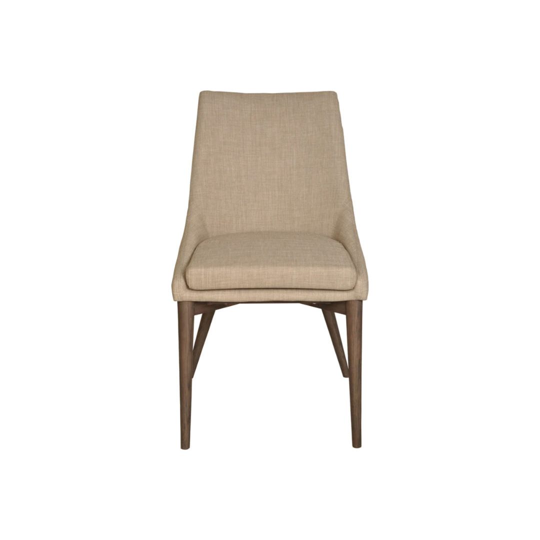 A front view of the Franny Dining Chair, Beige featuring a beige upholstered seat and backrest. The chair has a versatile design with tapered wooden legs in a light brown finish, giving it a sleek and contemporary look. The padded seat cushion offers comfort, and the removable cover adds practicality. The background is white.