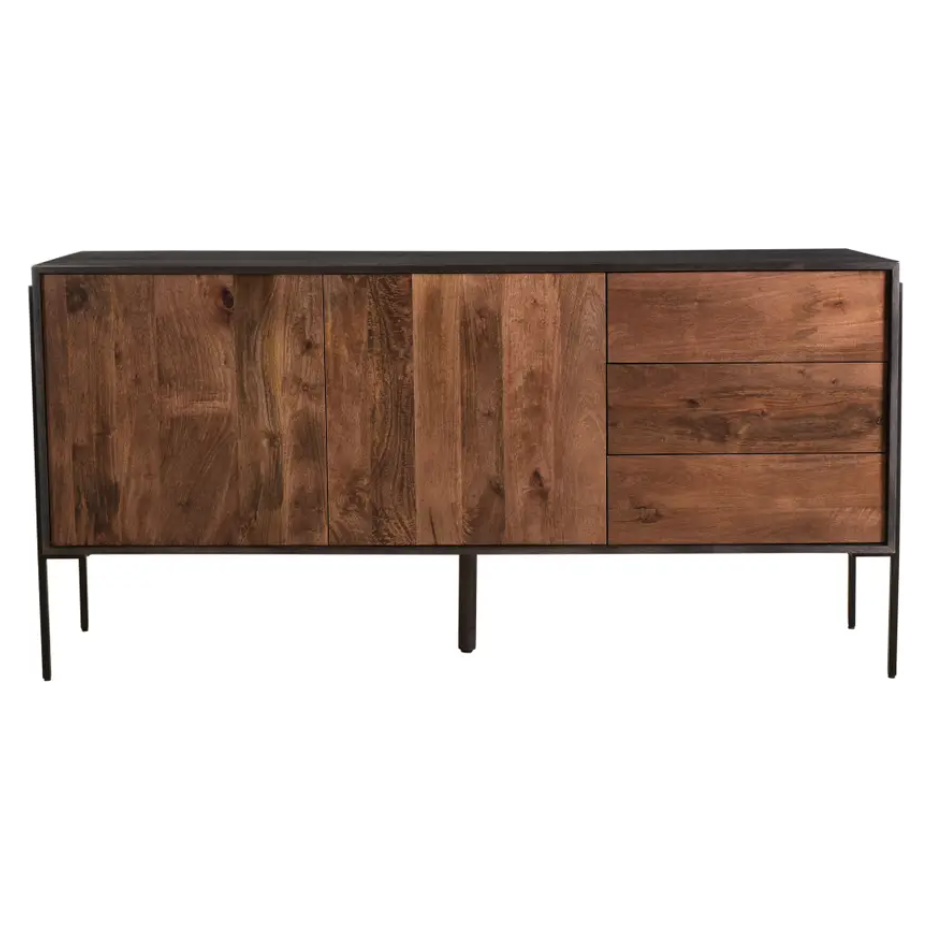 The Sona Sideboard is crafted from solid mango wood with a rich, natural finish. It features a smooth, rectangular top and three cabinets with patterned wood doors, supported by thin black metal legs. The sideboard’s design combines sleek modern aesthetics with industrial elements.