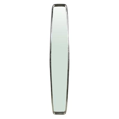 The Nickle Plated Mirror, Long features a tall and narrow design with a metallic frame and nickel-plated finish. Its slightly warped surface distorts reflections, while the shiny frame offers sleekness. The curvature adds an elongated effect, enhancing its imperfect rectangle charm.
