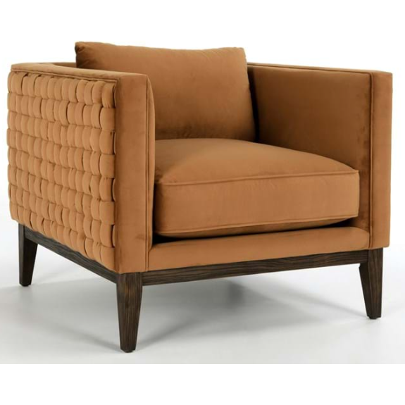A modern Amber accent chair with a deep tan cushion and a unique textured backrest featuring rows of padded squares. The chair has dark wooden legs and a matching single square cushion on the seat.