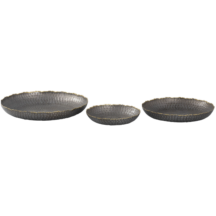 The Leonard Tray set includes three round black metal trays with a grey textured finish, displayed against a white backdrop. Each has a slightly uneven rustic edge and a hammered surface for a reflective effect. Arranged from largest to smallest, these trays exude an elegant charm.