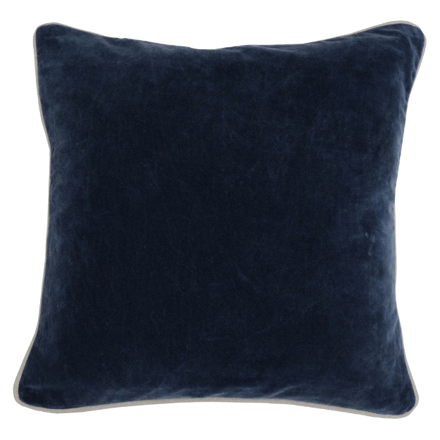 The Velvet Navy Throw Pillow showcases a sleek texture and softly rounded corners against a white backdrop, presenting a plush appearance. Its subtly piped edges refine its form, adding an elegant touch to the design, while a luxury insert enhances its sophistication.