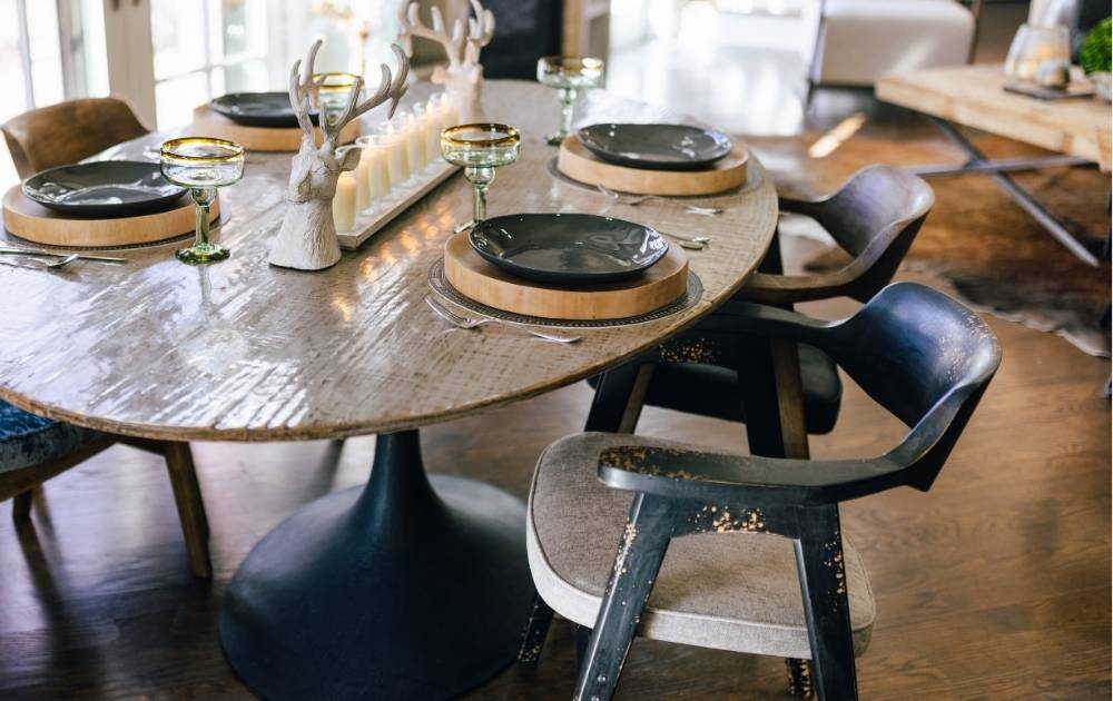 picture of wooden luxury dining table with turquoise chairs