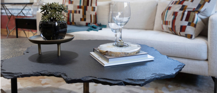 photo of a modern coffee table made of wood with black metal legs