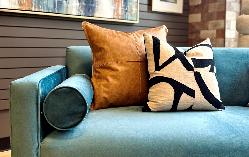 luxury throw pillows on a beautiful gold sofa