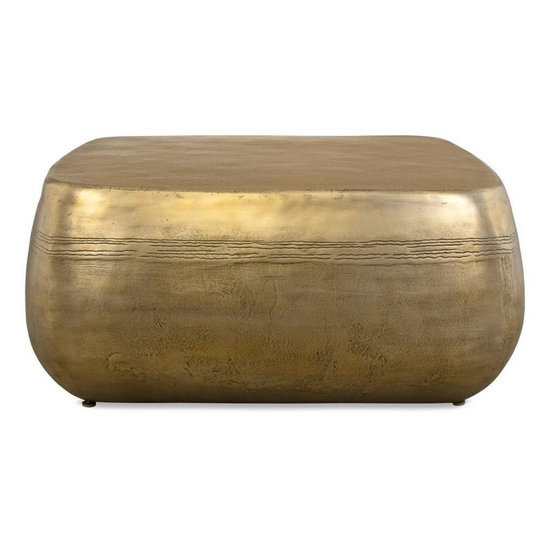 Brass coffee table with a textured surface on a white background