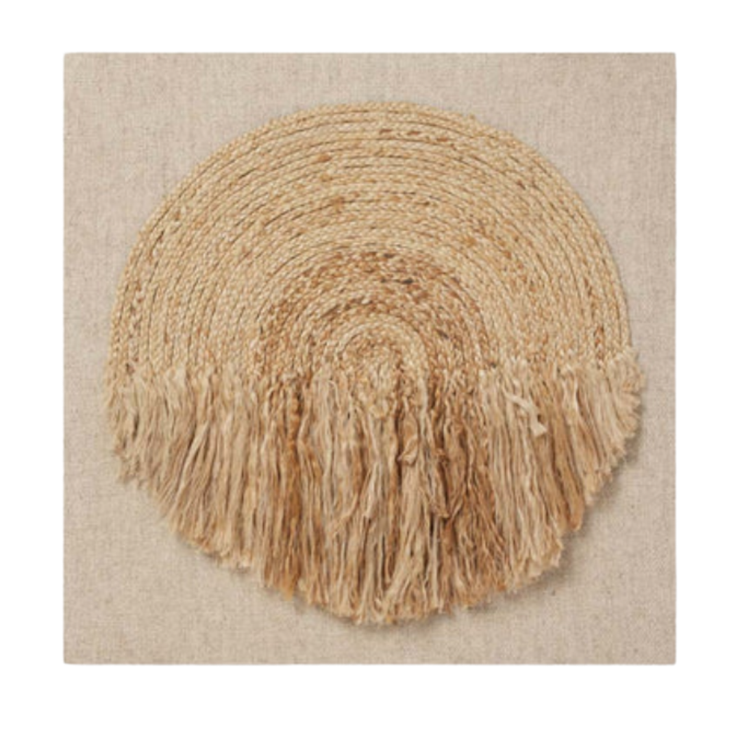 The Bellmont Braided Wool Boho Wall Art is a square beige canvas with a central circular woven design of natural fibers; loose wavy fringe on the lower half contrasts the smooth, tightly coiled upper section for organic texture and earthy tones.