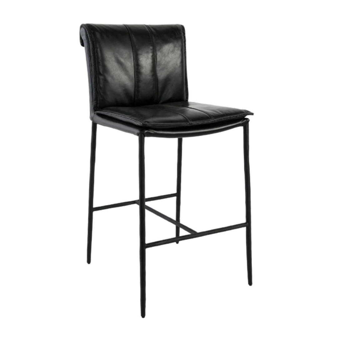 The Calder Leather Counter Stool boasts a sculptural metal frame with sleek slender legs, a simple footrest, cushioned leather upholstery, and a contoured backrest. Its tall black design offers modern comfort with a minimalistic aesthetic.