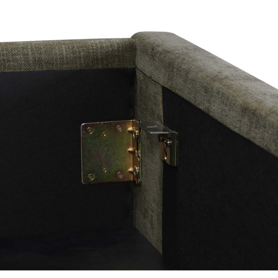 Close-up of a metal corner bracket secured with screws inside the Corveline Green Storage Bed, showing grey textured upholstery and black lining that reinforce the bed’s corner for enhanced durability.