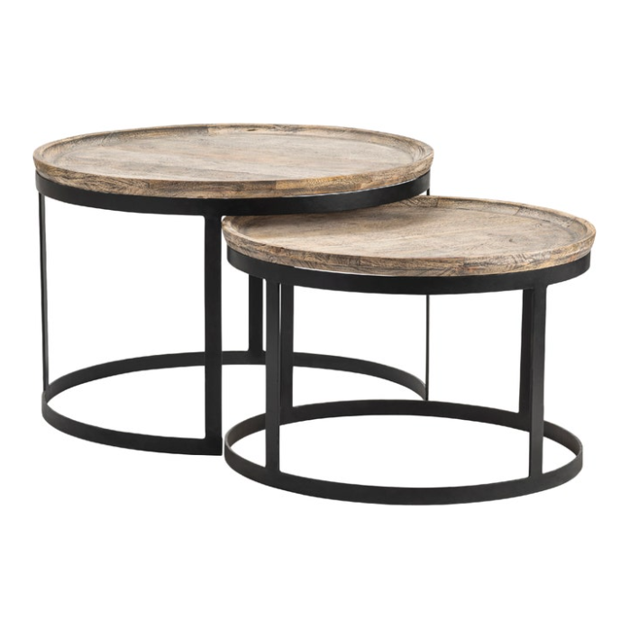 Introducing the Fillmore Nesting Coffee Tables: a pair of round tables with Mango wood tops and black metal frames. The larger table stands higher and slightly behind the smaller one, each featuring a circular base and an open design that highlights a modern, industrial aesthetic. The wooden tops are finished with a rustic touch.