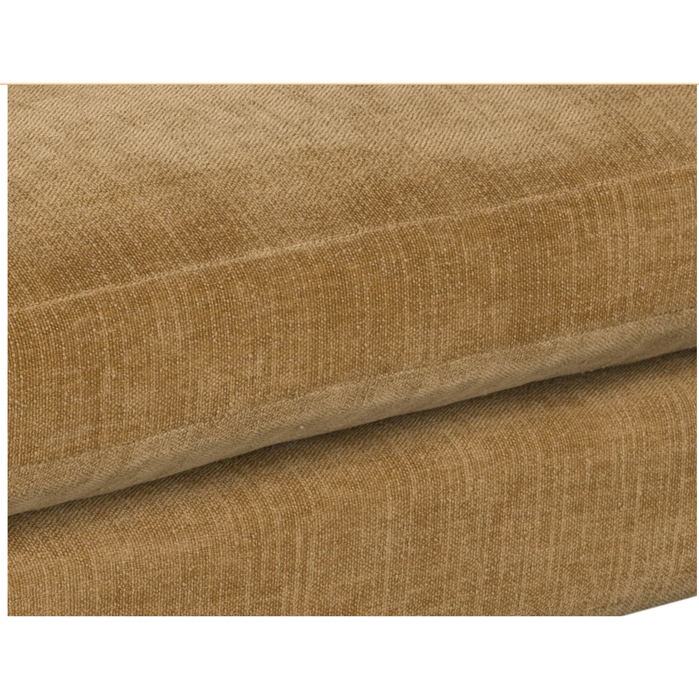 Close-up of two stacked, beige cushions with textured fabric on the Gina Mustard Sofa. Subtle horizontal patterns and shadows highlight their plush surfaces, while tidy sewn edges enhance the look. A hint of mustard adds a modern touch.