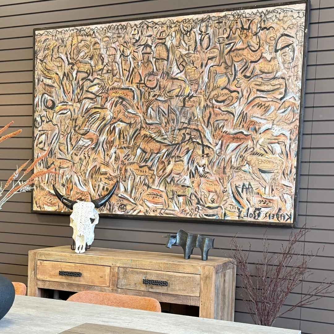 Buy original art by Kader Boly — abstract canvas painting with handcrafted black frame mounted above a dining sideboard.