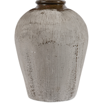 The Rice Wine Jar, Medium is a textured, off-white ceramic vase featuring vertical ridges and a glossy finish. It has a slightly tapered neck and displays a subtle color gradation from darker near the neck to lighter at the base. The jar's rustic, handmade appearance suggests an artisanal quality that adds a vintage touch to any decor.