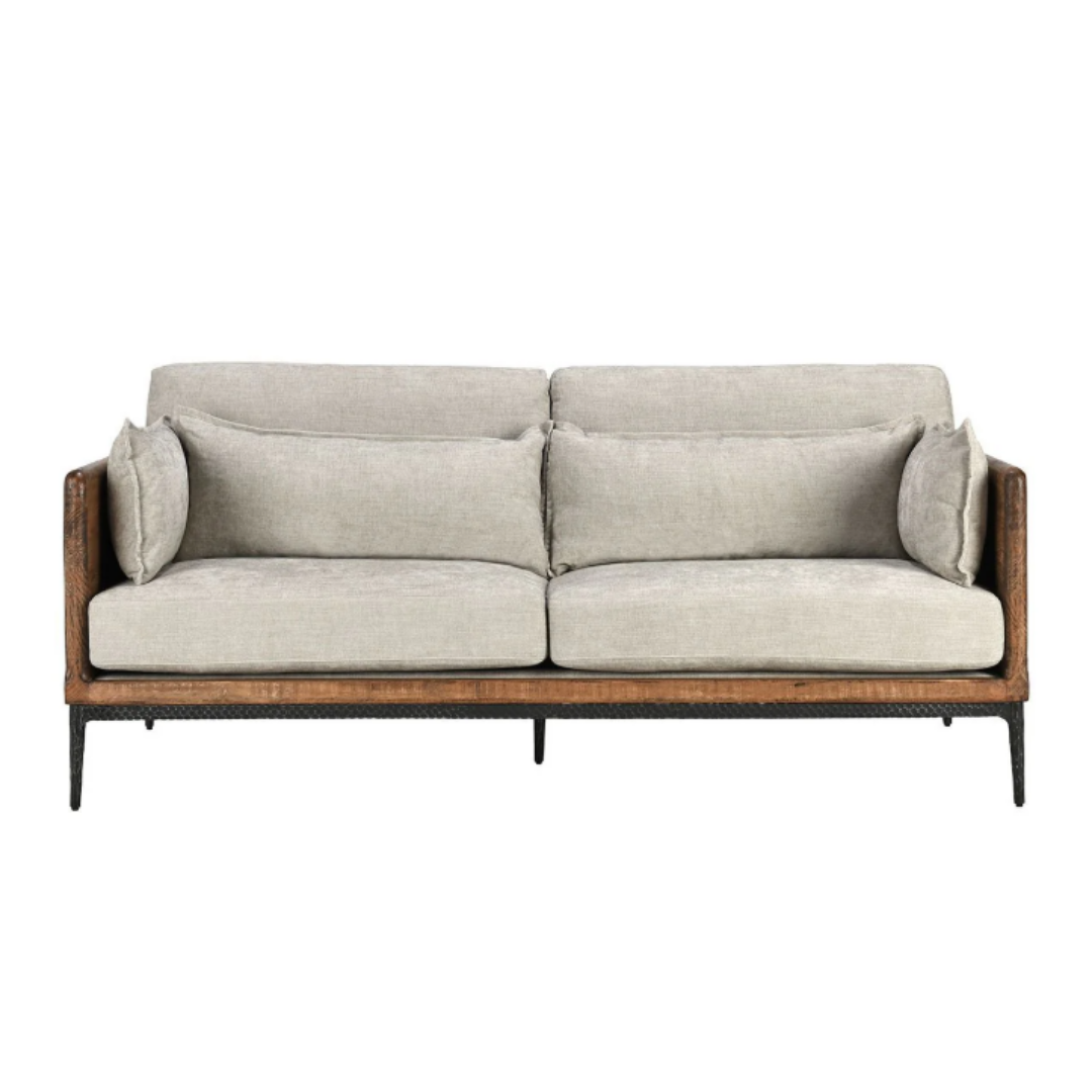 The Saville Upholstered Sofa showcases a modern design with a reclaimed pine frame and sleek black metal legs. It features light gray polyester fabric cushions for seating and back support, plus side cushions. Its minimalist style emphasizes clean lines and neutral tones.