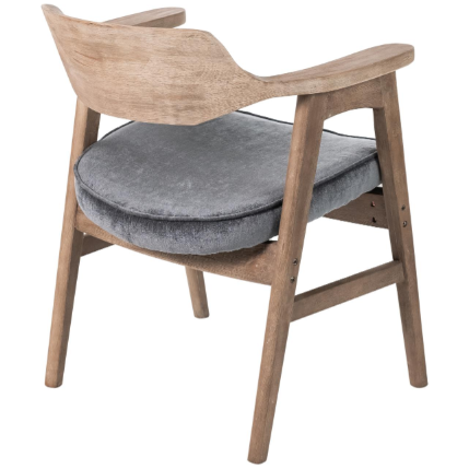 The Vintage Dining Chair, Medium Gray/Pewter, features a curved backrest and armrests with a light brown finish for rustic charm. It has an upholstered seat with a round gray cushion and stands on four legs with a simple, modern design.