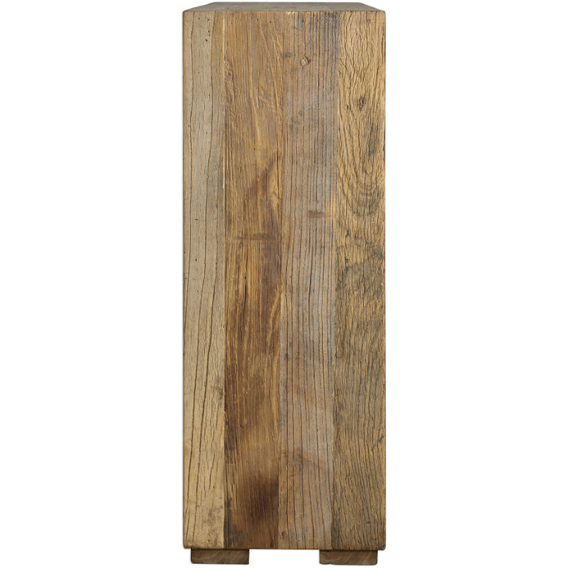 The Ridge Console Table stands upright, showcasing natural wood grain and weathered brown tones. Crafted from reclaimed elm, this tall table features a rustic, unfinished look with squared edges and a flat top.