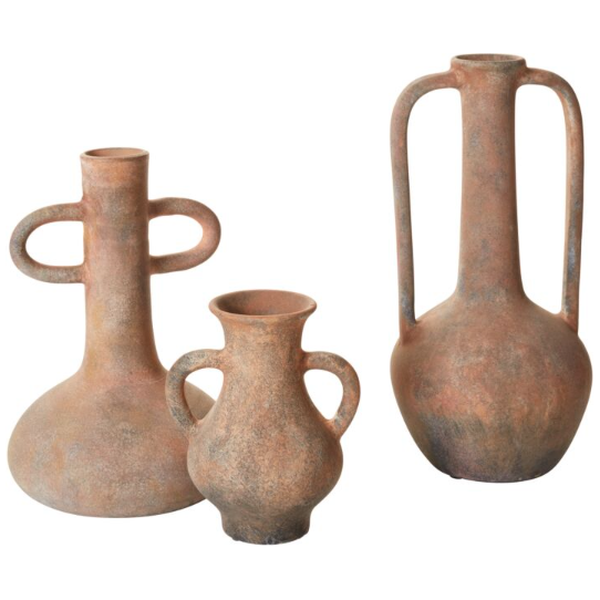 Three Tupita Vases in rustic terracotta are displayed: one wide with horizontal handles, one small with rounded handles, and one tall with vertical handles extending above the rim. Each vase has a weathered brown finish and a unique silhouette.