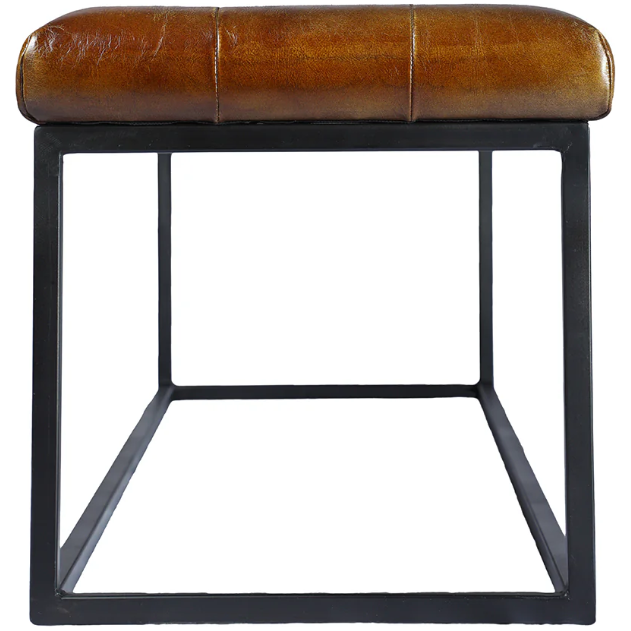 Introducing the Northwood Bench: a modern rectangular stool featuring a black metal frame and a brown button-tufted leather cushioned seat. The seat showcases a smooth, polished finish with visible stitching along the seams. Its open frame design forms a sleek cuboid shape, achieving a minimalist aesthetic.