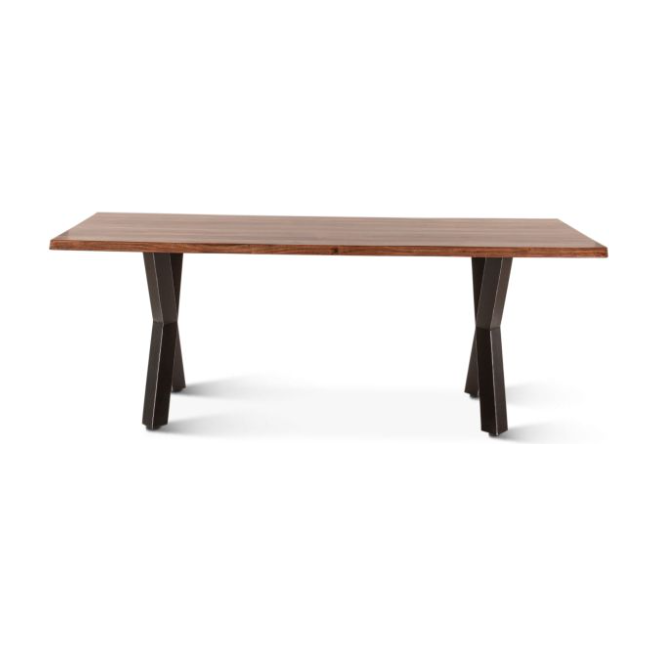 The Bisbee Live Edge 80" Dining Table highlights a rectangular top with a natural Sheesham wood grain finish. Supported by outward-angled black metal legs, it captures an industrial design and sits in an empty room against a plain white background, exuding modern elegance.