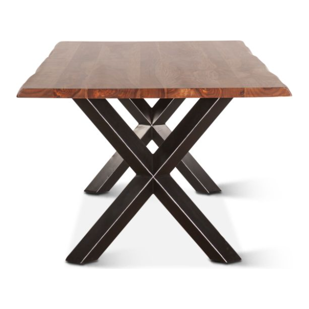 The Bisbee Live Edge 80" Dining Table features a Sheesham wood top with a rich dark brown finish, natural grain, and slightly curved edges. Its rectangular design and unique double X-shaped black metal base provide an industrial contrast to the warm wood.