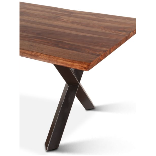 The Bisbee Live Edge 80" Dining Table is crafted from rich Sheesham wood with a natural grain finish, featuring a rectangular top with slightly rounded edges. It stands on unique black X-shaped metal legs, adding an industrial design element that contrasts the warm wood against a white background.