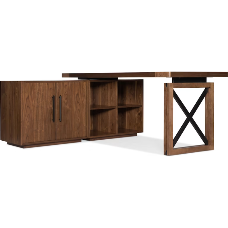 The Soren Walnut 64" Modular Desk Top features a modern L-shaped design with sleek black metal X accents, open shelves, and a dual-door cabinet with black handles—blending style and function for versatile workspace solutions.