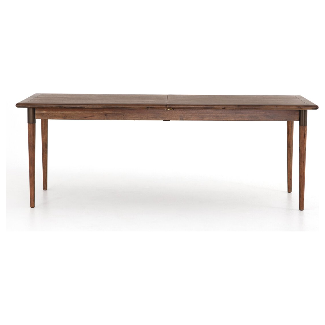 The Teresa Extension Dining Table is a rectangular wooden table with a mid-century modern design crafted from acacia wood. It features four tapered legs and has a central split, indicating its extendability. The surface boasts a darker toasted walnut finish, while the legs are slightly lighter, giving it a sleek and minimalist look against a white background.