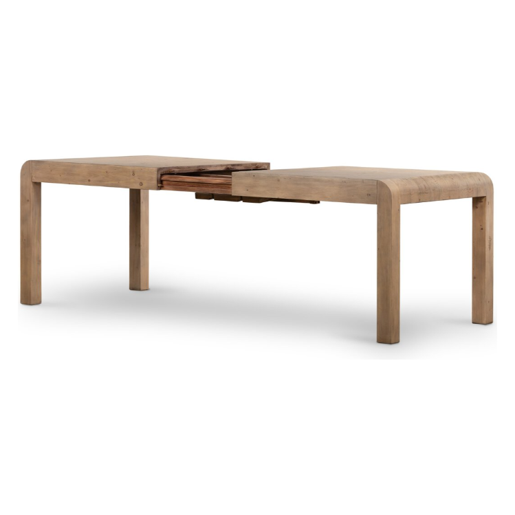 Displayed is the Lotta Extension Dining Table, a minimalist wooden extendable piece characterized by its Parsons-style design. It features four sturdy legs and includes a central butterfly leaf extension mechanism that reveals a darker wood panel. The table's light brown finish with a smooth texture beautifully emphasizes the natural grain of the reclaimed wood.