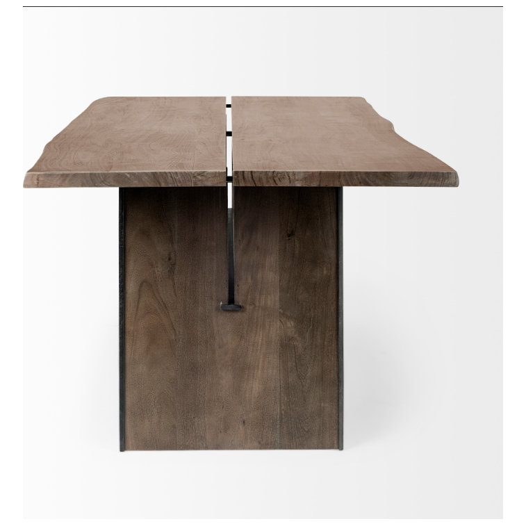 The Vesper 84" Dining Table is a modern live-edge dining table crafted from Indian mango wood. It features a central split along its length and is supported by a single, wide rectangular pedestal base. The natural wood grain and texture are prominent, giving it an organic and rustic look, all set against a plain white background.