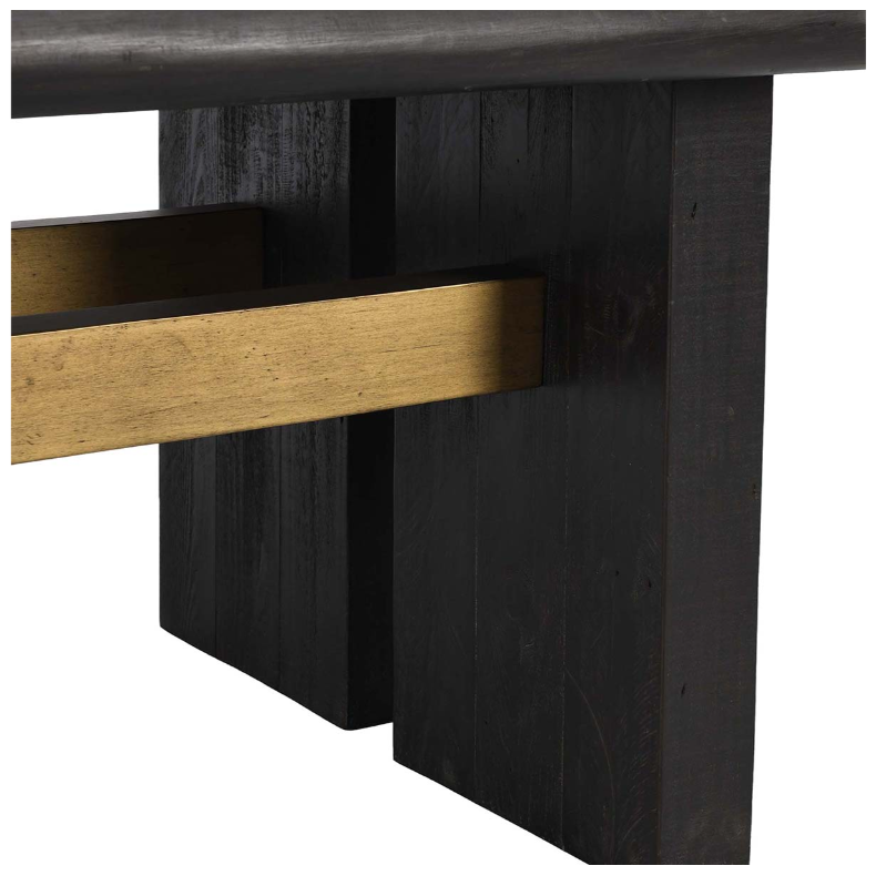 Close-up of an elegant Echo Reclaimed 96" Dining Table leg featuring a modern, minimalist design. The leg is made of dark wood with a grainy texture, complemented by a gold-colored horizontal support beam connecting the legs. This sleek and contemporary piece exemplifies sustainable furniture practices.
