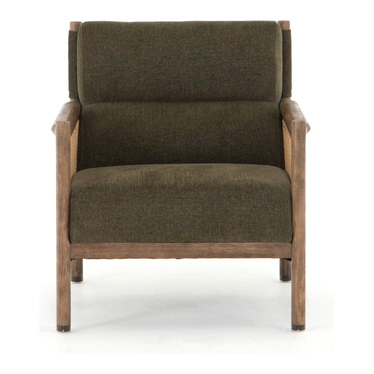 The Julius Accent Chair features dark green upholstery, a wooden frame with cane side paneling, and a chenille-textured cushioned seat and backrest. Its straight wooden legs and arms create a modern, minimalist look against a plain white background.