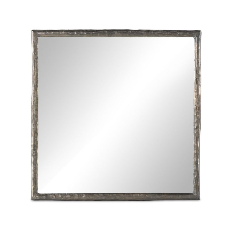 The Hammered Nickel Wall Mirror features a square design with a metallic frame showcasing a subtly hammered texture. The beveled frame is finished in a dark gray, nearly black hue, offering a striking contrast to the mirror's reflective surface. Its minimalist design adds modern and stylish elegance to any home decor.