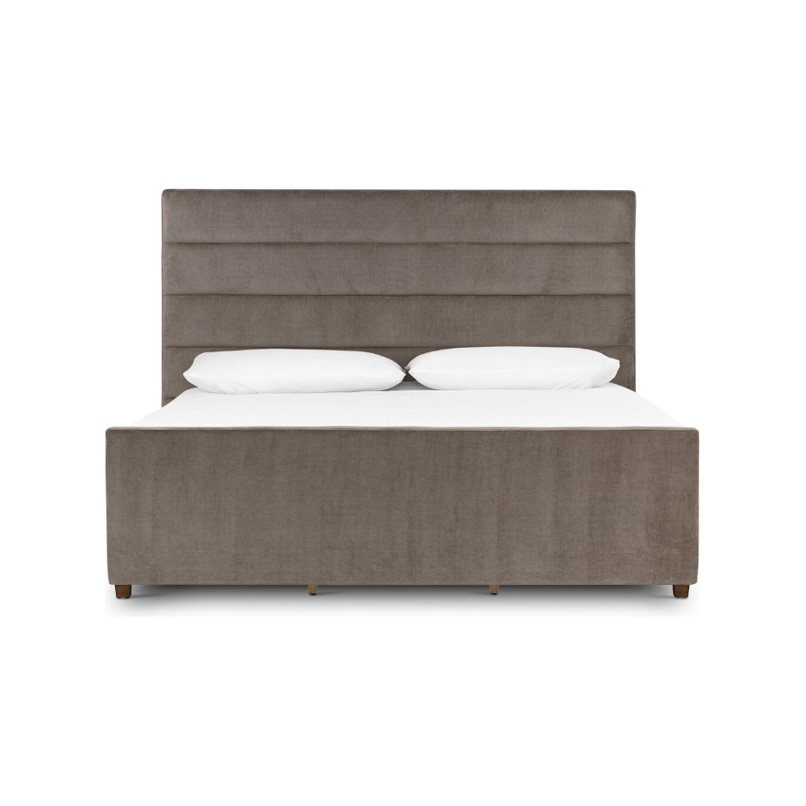 Discover the Seraphine Bed, a stunning piece of modern design characterized by its tall, upholstered dark gray headboard with sophisticated horizontal panel stitching. The sumptuous upholstery complements the footboard and sides perfectly, while the bed rests elegantly on short wooden legs for a refined appearance.