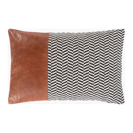 The Havana Leather Stripe Lumbar Throw Pillow features one side in smooth brown leather and the other in a black-and-white chevron fabric, offering modern contrast. A feather down insert ensures luxurious comfort and support.