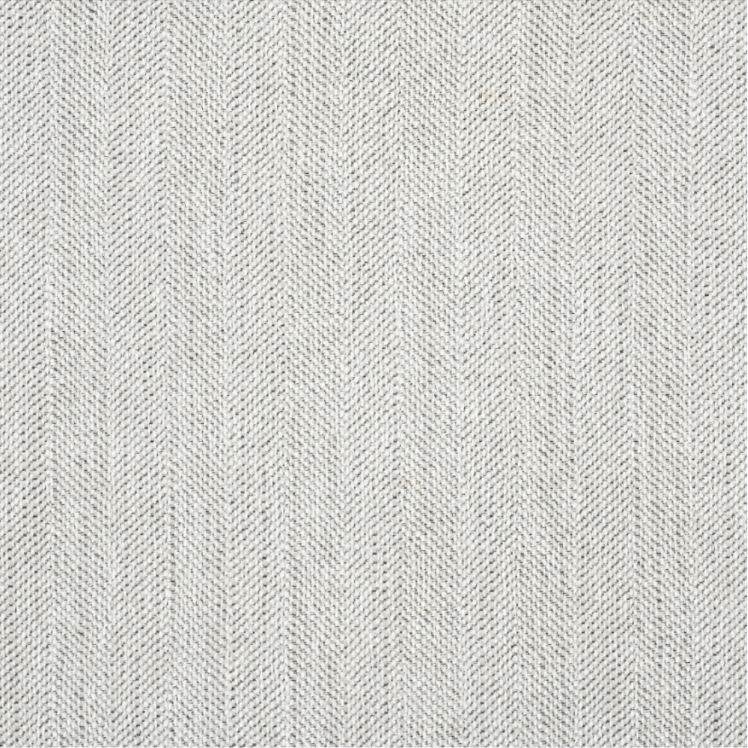 The Veyra Plush Upholstered Armchair in Frost Grey features a light gray fabric with a subtle herringbone pattern. Its finely woven texture consists of alternating diagonal lines, creating a stylish zigzag effect—ideal for modern luxury in clothing or home decor.