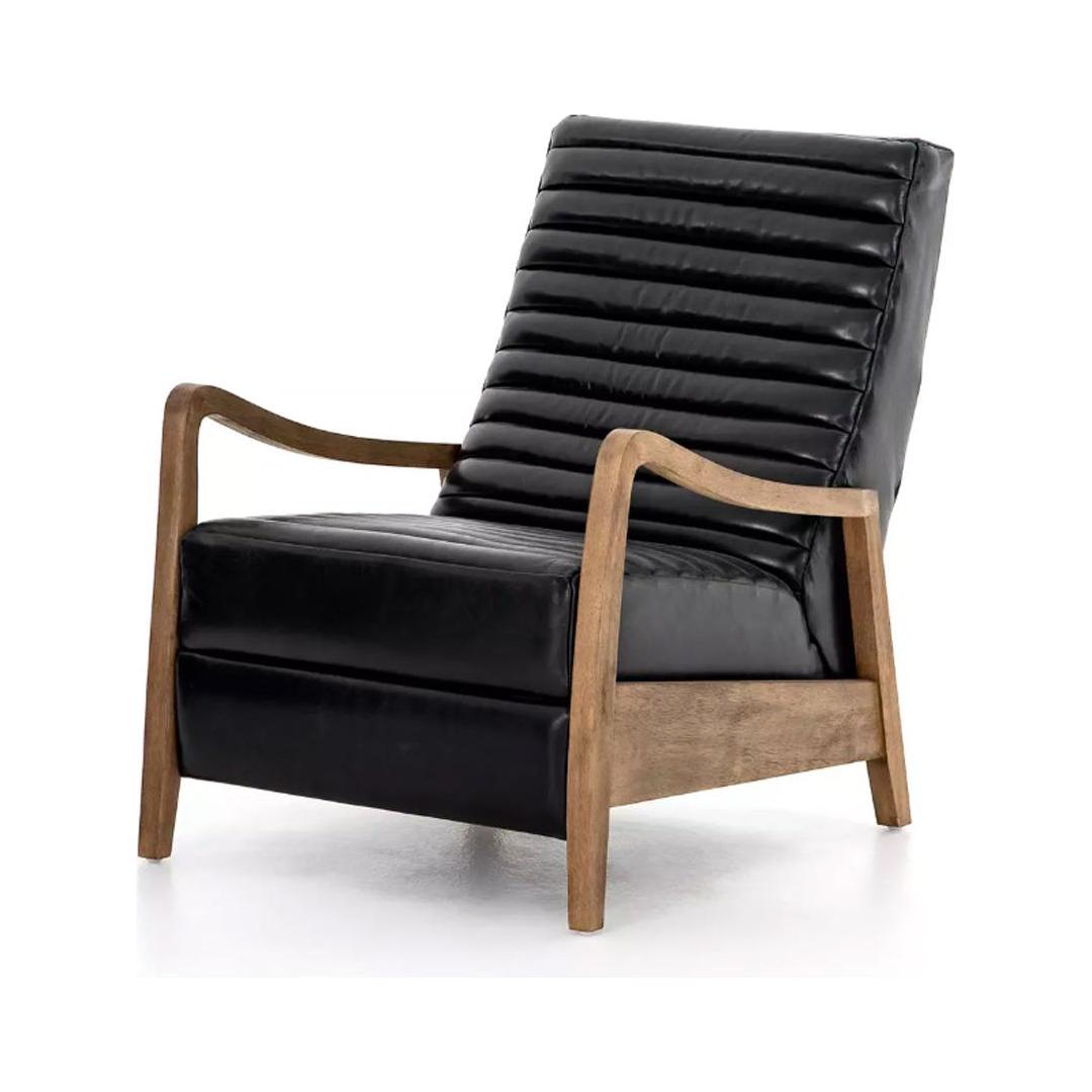 The Terra Leather Recliner in black features a slanted ribbed cushion and backrest, light wood frame and armrests for a mid-century look. Its short legs complete the modern design, shown against a plain white background.