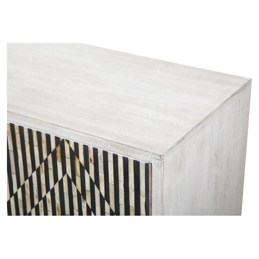 The Terra Noir Sideboard Media Cabinet showcases a close-up of a whitewashed wooden corner, featuring a geometric front panel with black and wood-tone stripes forming intersecting triangles. Made from horn and mango wood, it adds a modern, artistic flair to the rustic surface.