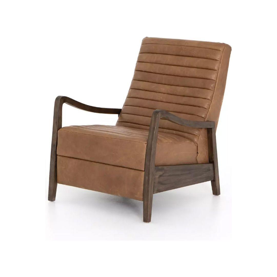 The Terra Leather Recliner, Taupe features a modern low-angled seat with tan top-grain leather and horizontal stitching. Slim dark wood armrests and legs add sleek style, creating a contemporary look against a plain white backdrop.