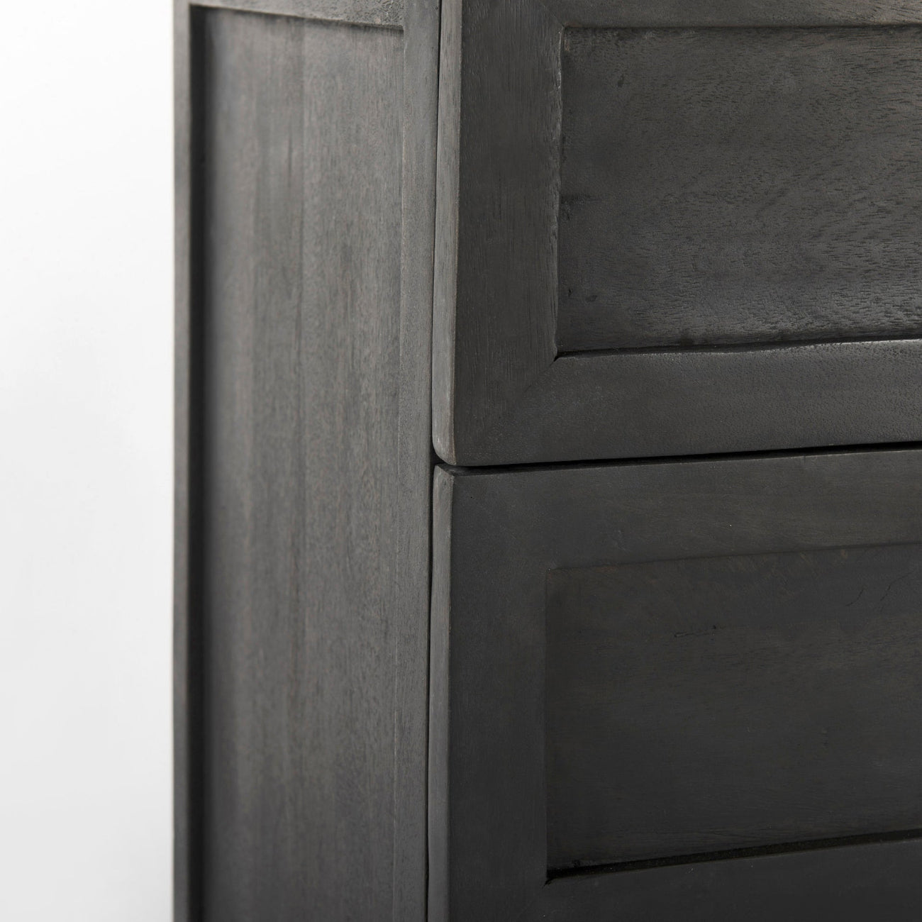 Close-up of a dark wooden cabinet with a white background