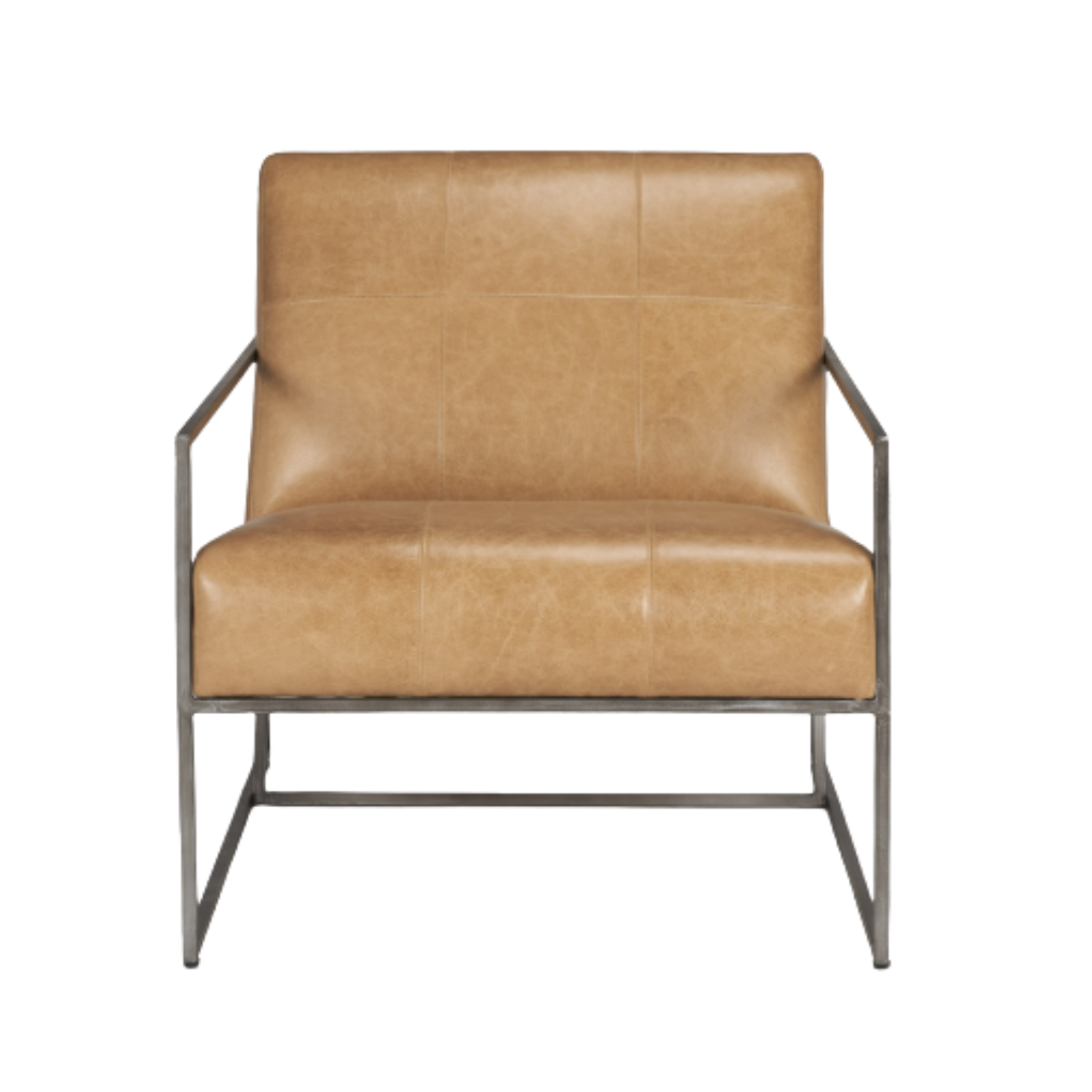 The Vercelli Handcrafted Leather Accent Chair showcases modern minimalism with tan buffalo leather, sleek metal armrests, cushioned squares, and a rectangular metal base adding to its minimalist appeal.