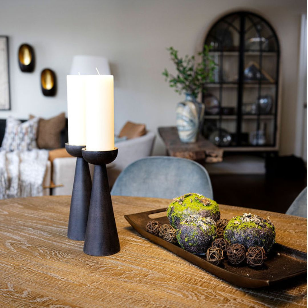 Professionally furnished and styled open-concept living and dining room.