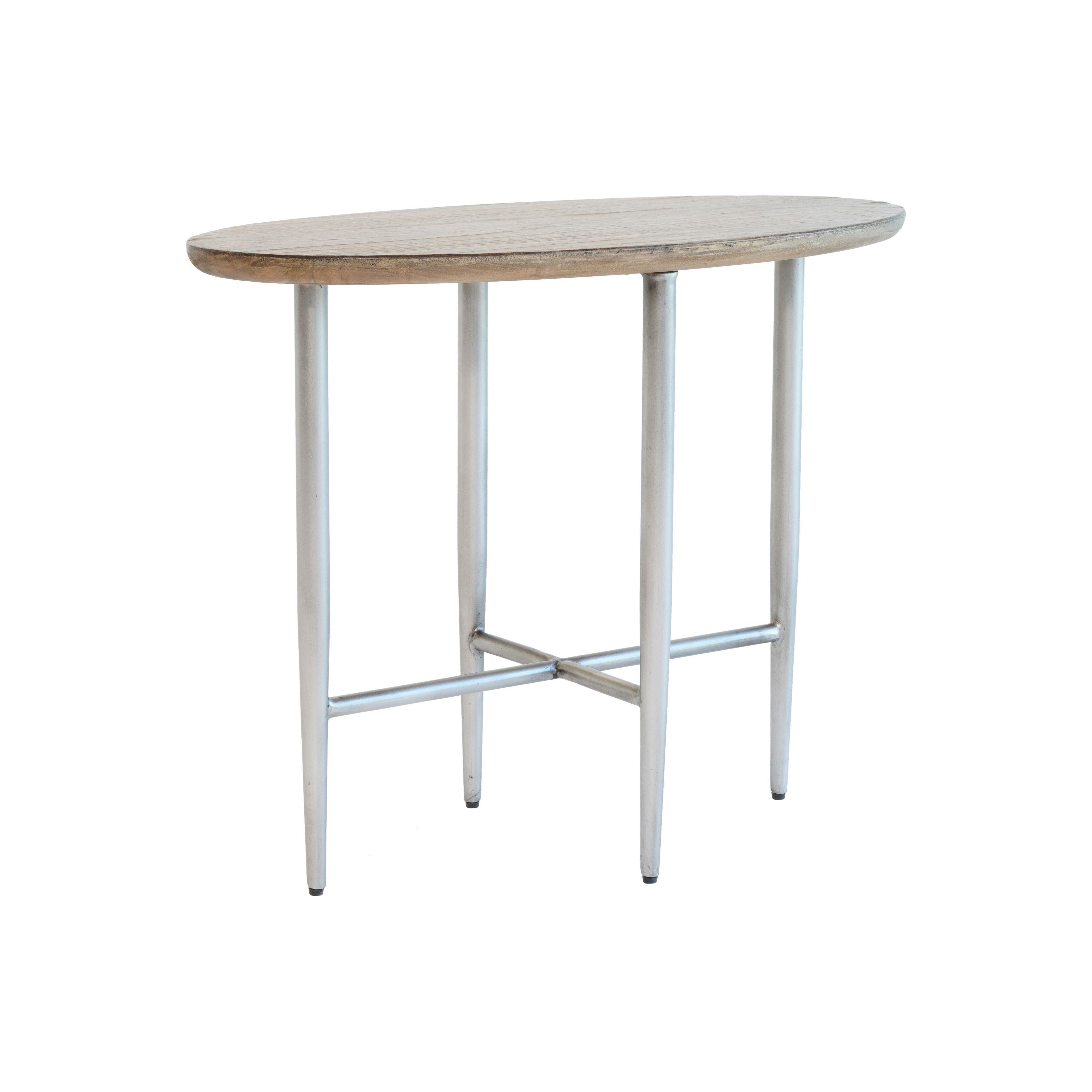The Howard Side Table features an oval-shaped wooden top supported by four slender, angled metal legs. A crossbar enhances its stability, while the table's combination of rustic elegance and minimalist modern design seamlessly blends natural wood with sleek metal accents.